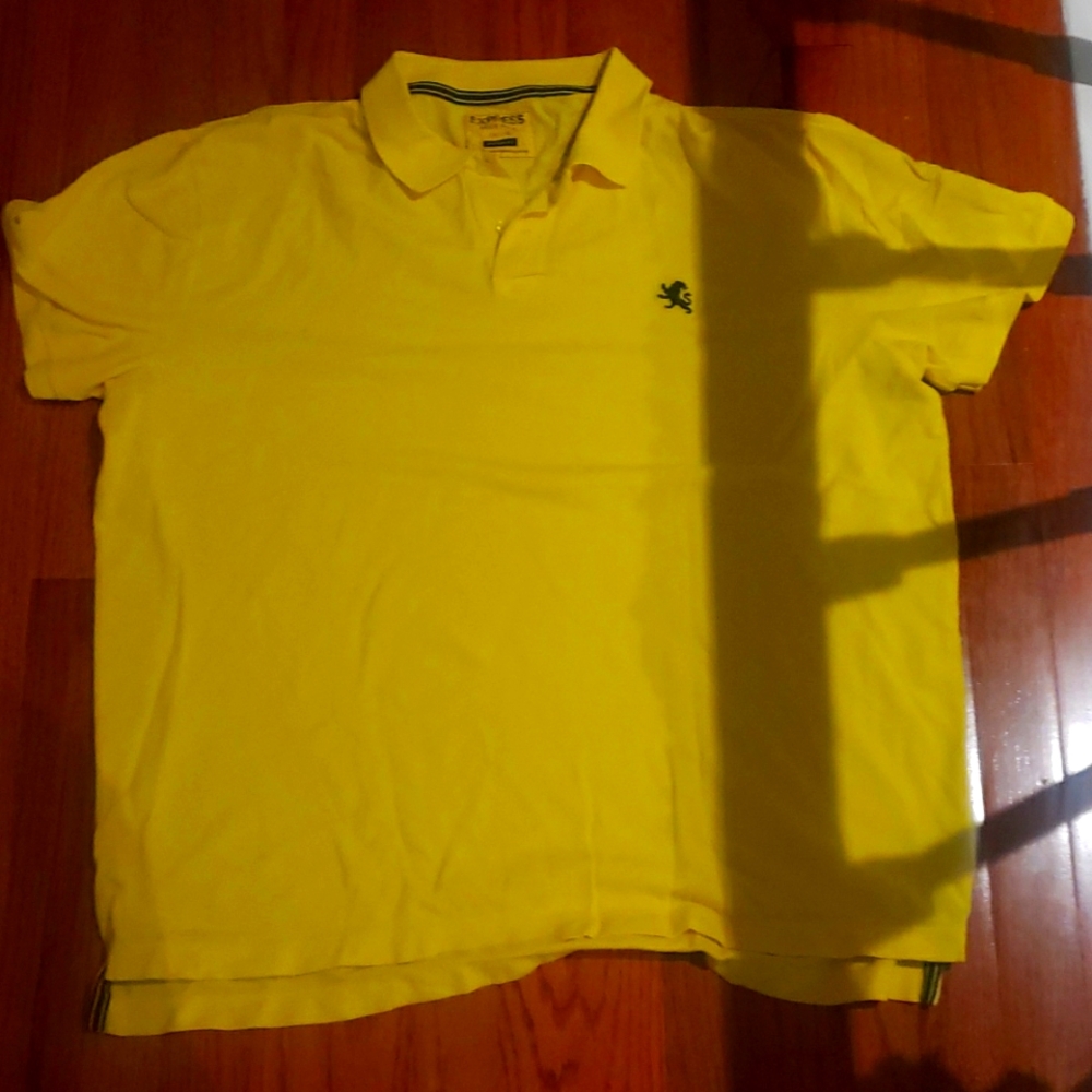 Yellow polo , bright yellow still in good condition